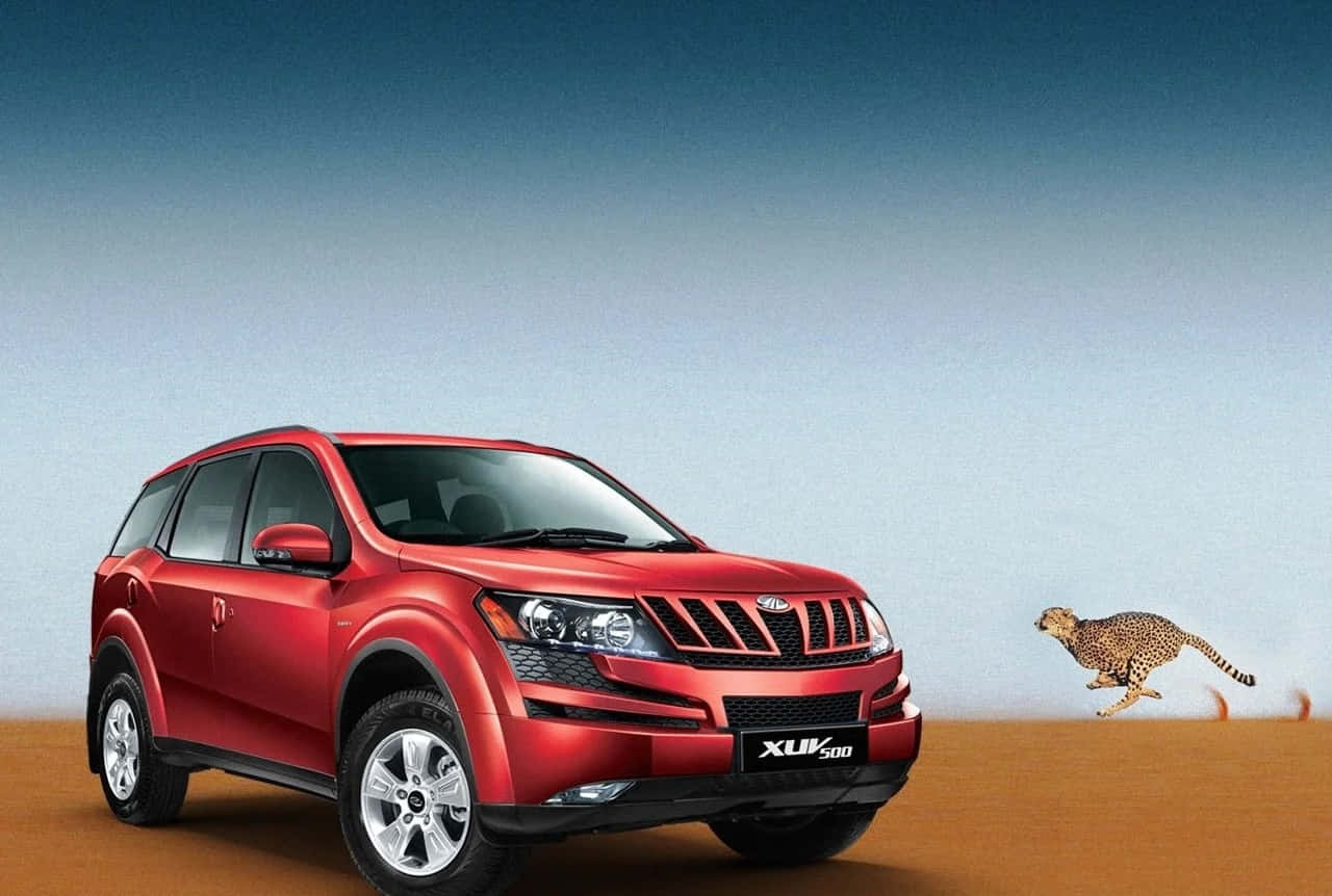 Sleek Mahindra XUV500 in Motion Wallpaper