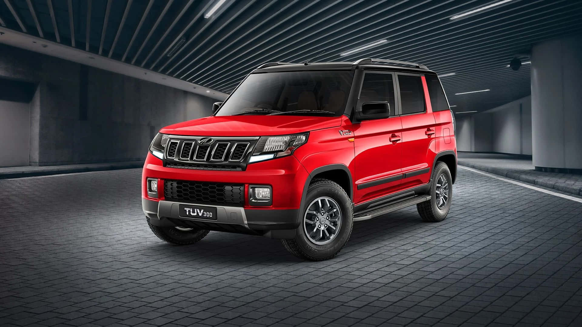 Mahindra SUV on a scenic mountain getaway Wallpaper