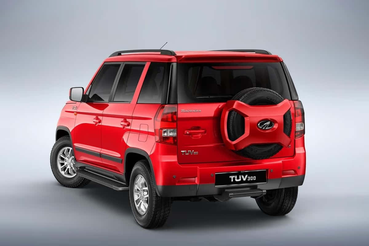 Vue Latérale Rouge Du Mahindra Tuv300 Fond d'écran