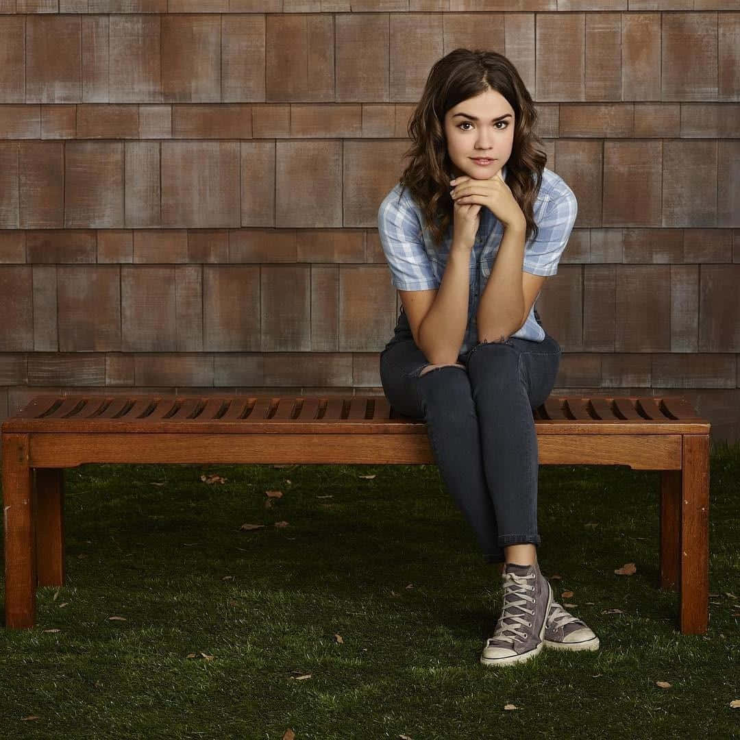 Maia Mitchell Casual Bench Pose Wallpaper