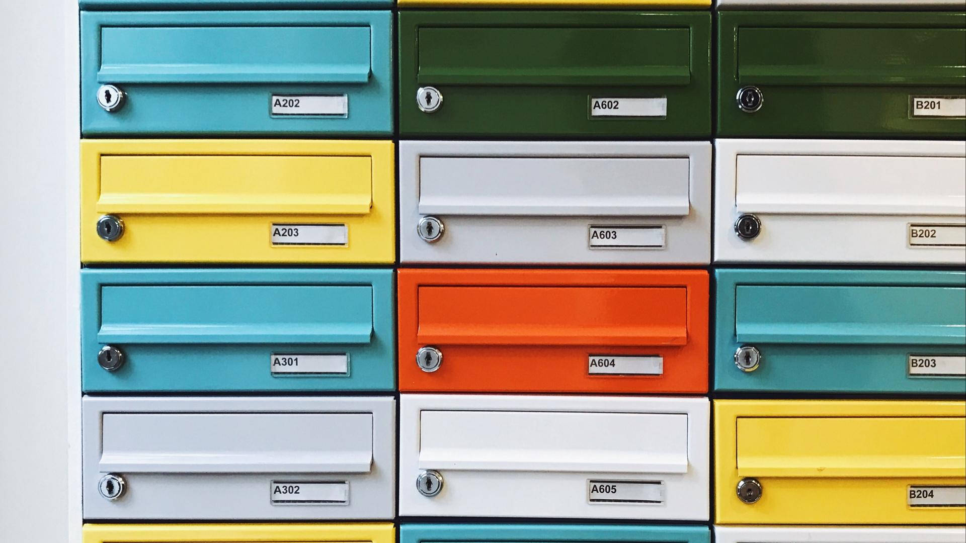 Mail And Colorful Postboxes Wallpaper