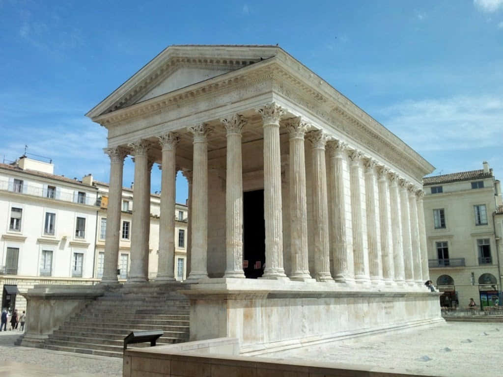 Exceptional View of Maison Carrée on a Sunny Day Wallpaper
