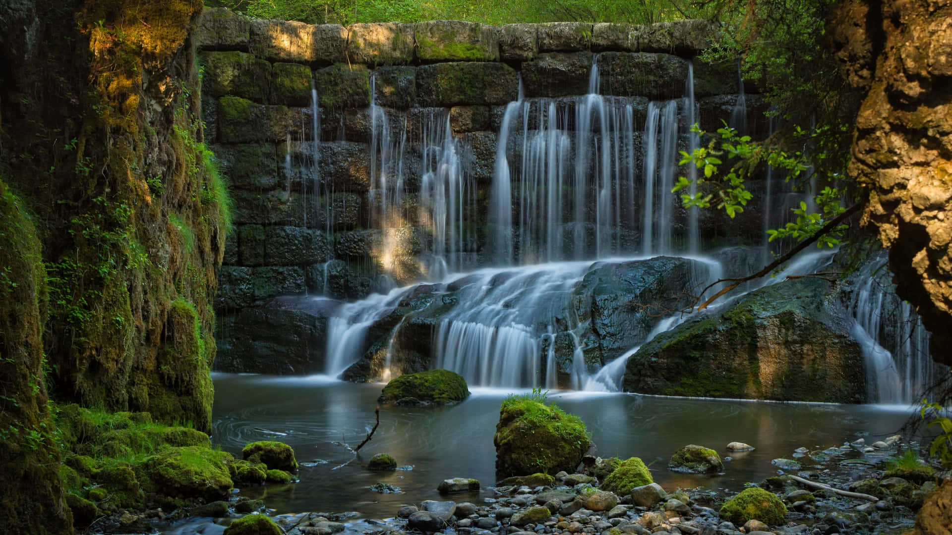 Majestic 4k Waterfall In Natural Splendor Wallpaper