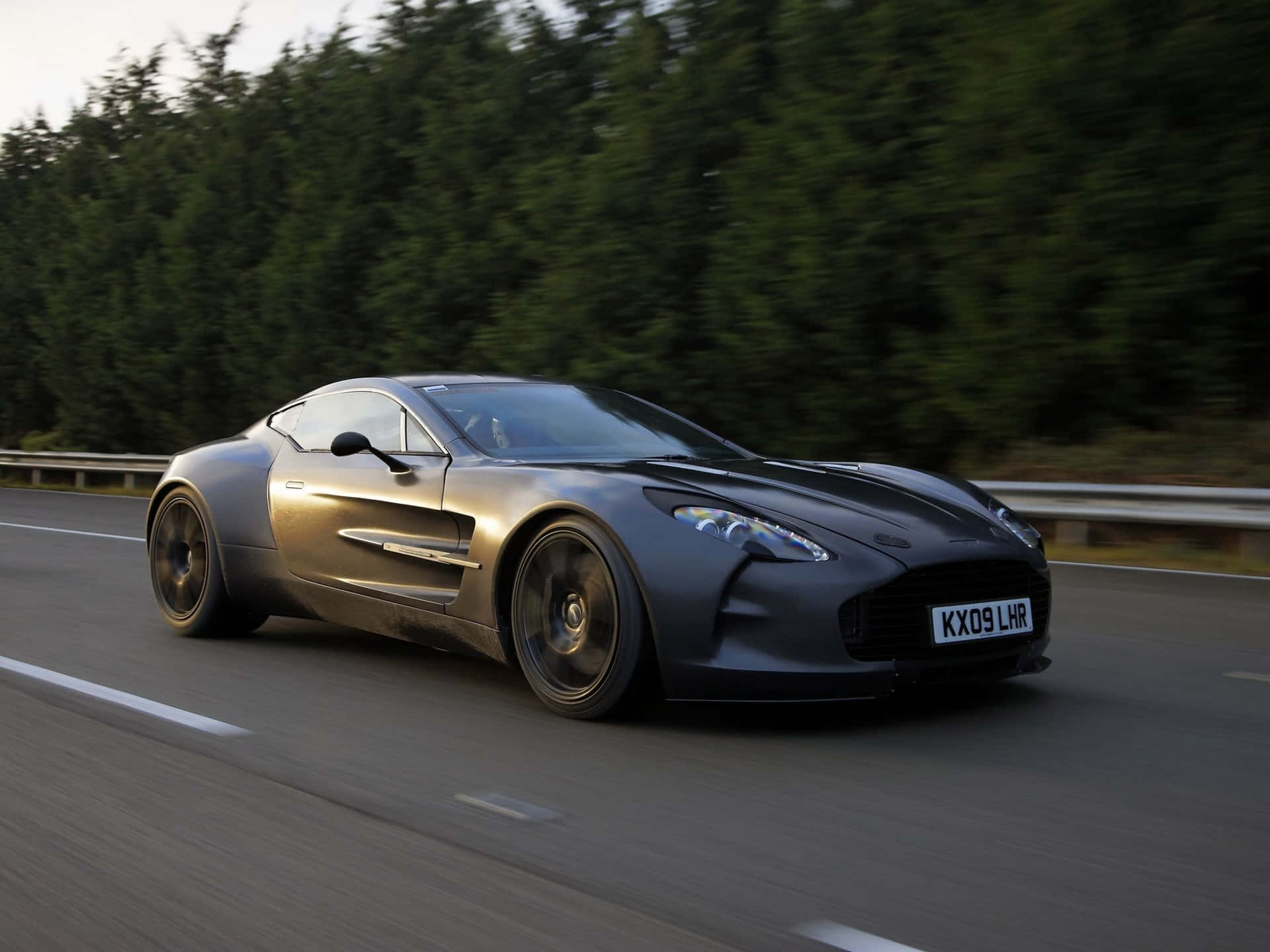 Majestic Aston Martin One-77 In Action Wallpaper