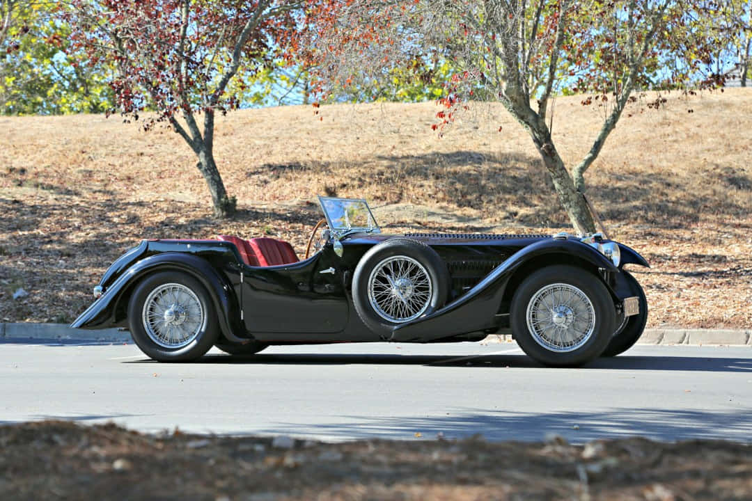 Majestic Bugatti Type 57sc Atlantic In Classic Noir Wallpaper