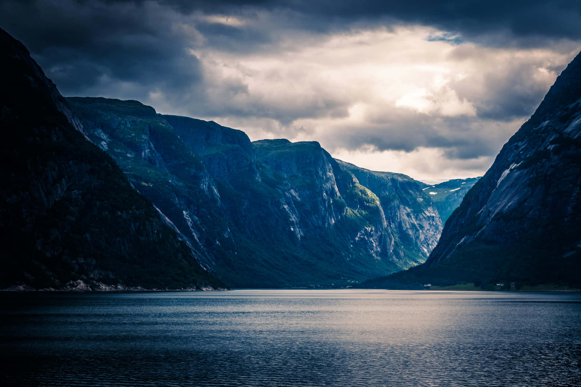 Majestic_ Fjord_ Under_ Stormy_ Skies.jpg Wallpaper