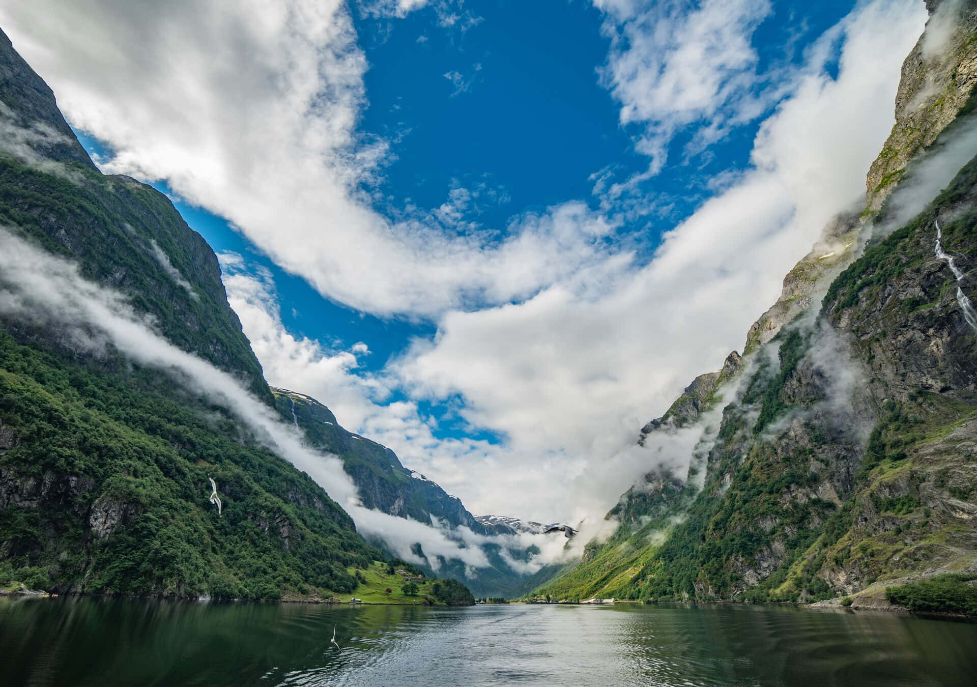 Majestic_ Fjord_with_ Mist_and_ Waterfalls.jpg Wallpaper