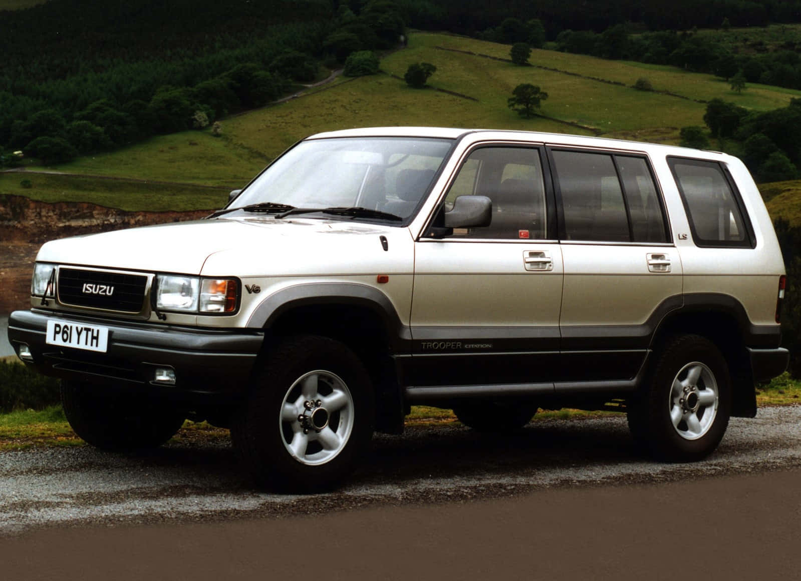 Majestic Isuzu Trooper On A Mountain Outing Wallpaper