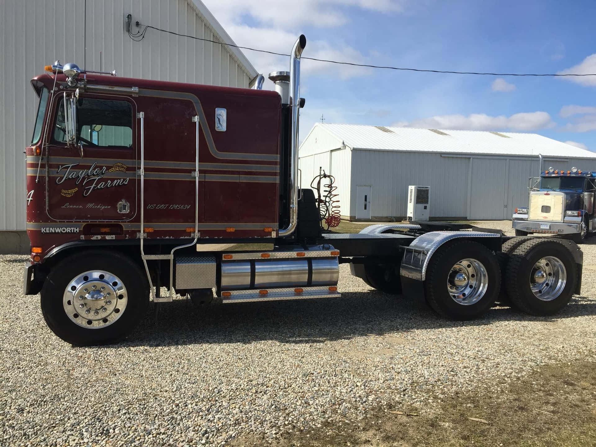 Majestic Kenworth K100 Big Rig On The Open Road Wallpaper