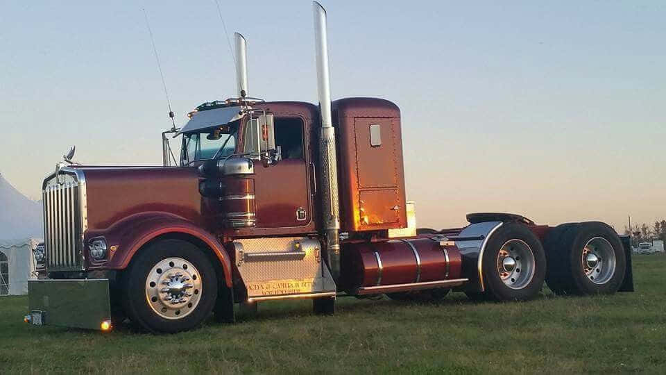 Majestic Kenworth K100 Tractor-trailer On The Road Wallpaper