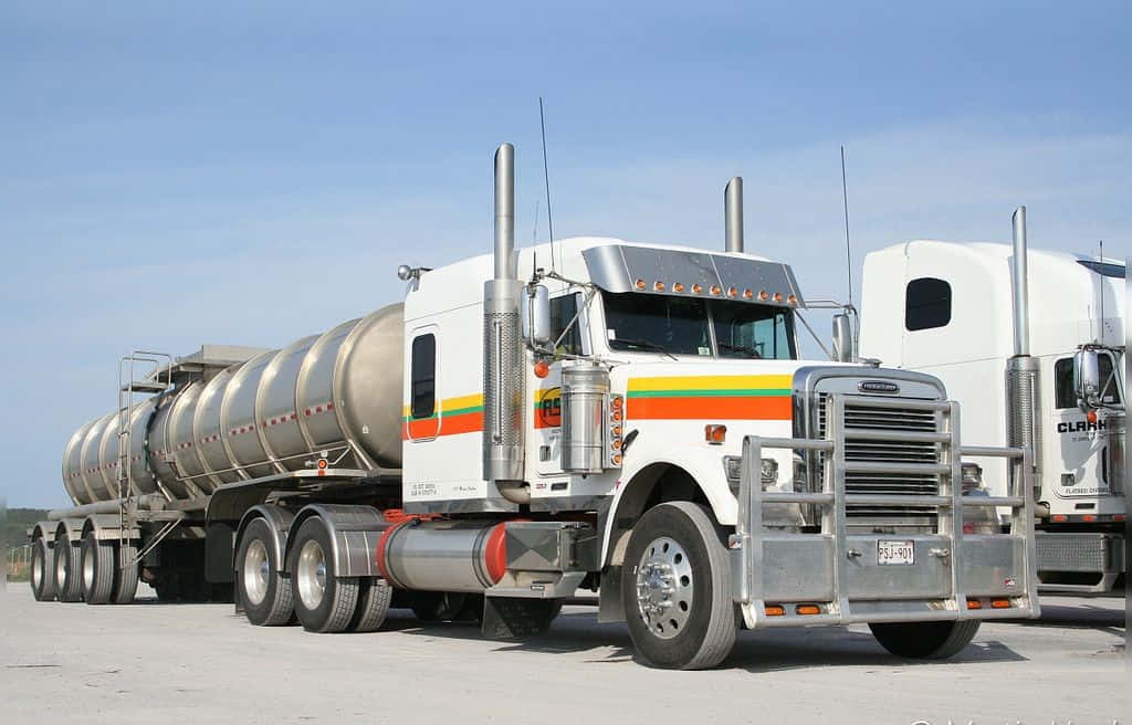 Majestic Kenworth T604 Truck On Open Road Wallpaper