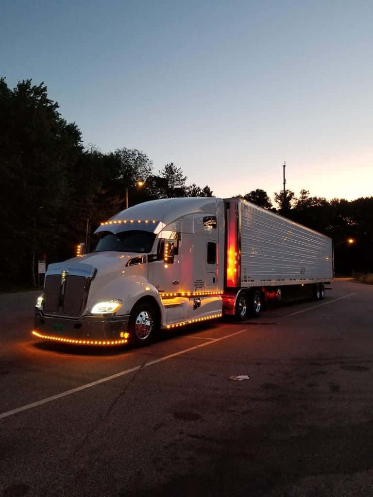 Majestic Kenworth T604 Truck On Road Wallpaper