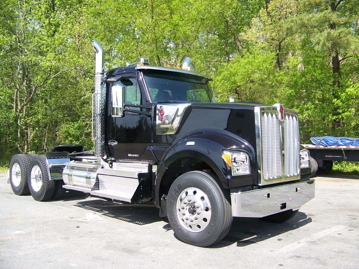 Majestic Kenworth W990 Big Rig On The Open Road Wallpaper