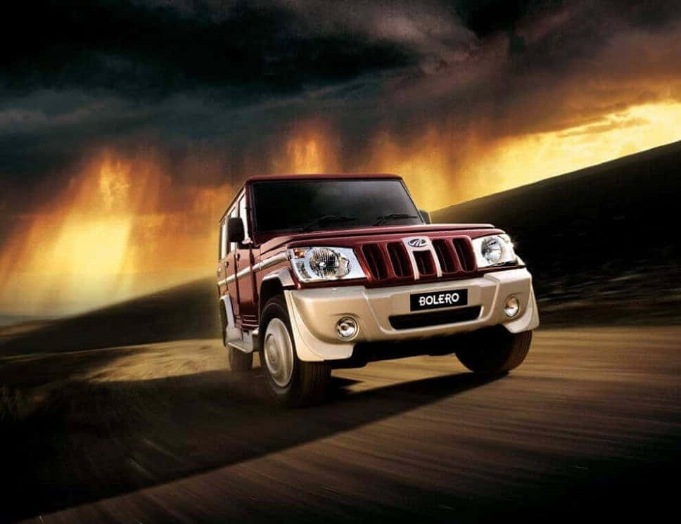 Majestic Mahindra Bolero Dominating The Terrain Wallpaper