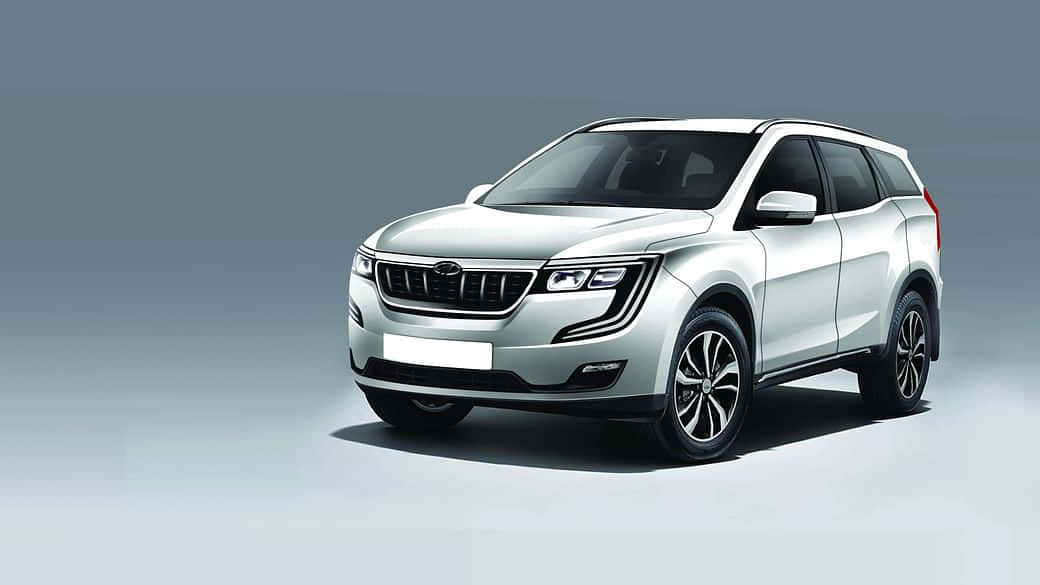 Majestic Mahindra Xuv500 In Natural Backdrop Wallpaper