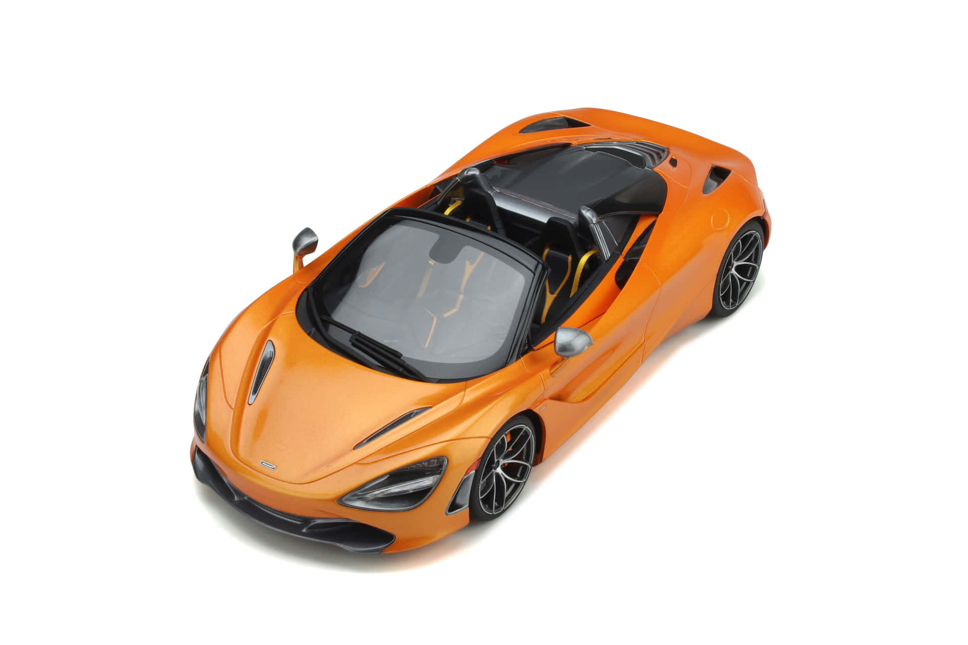 Majesteettinen Mclaren 720s Spider Vapauttamassa Voimaa Eloisana Päivänä Taustakuva