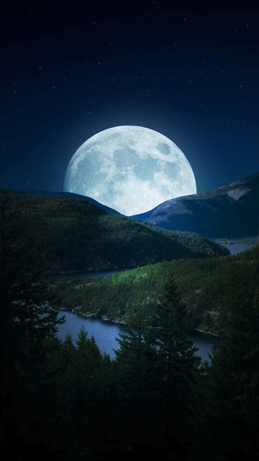 Majestic Moonrise Over Mountains Wallpaper