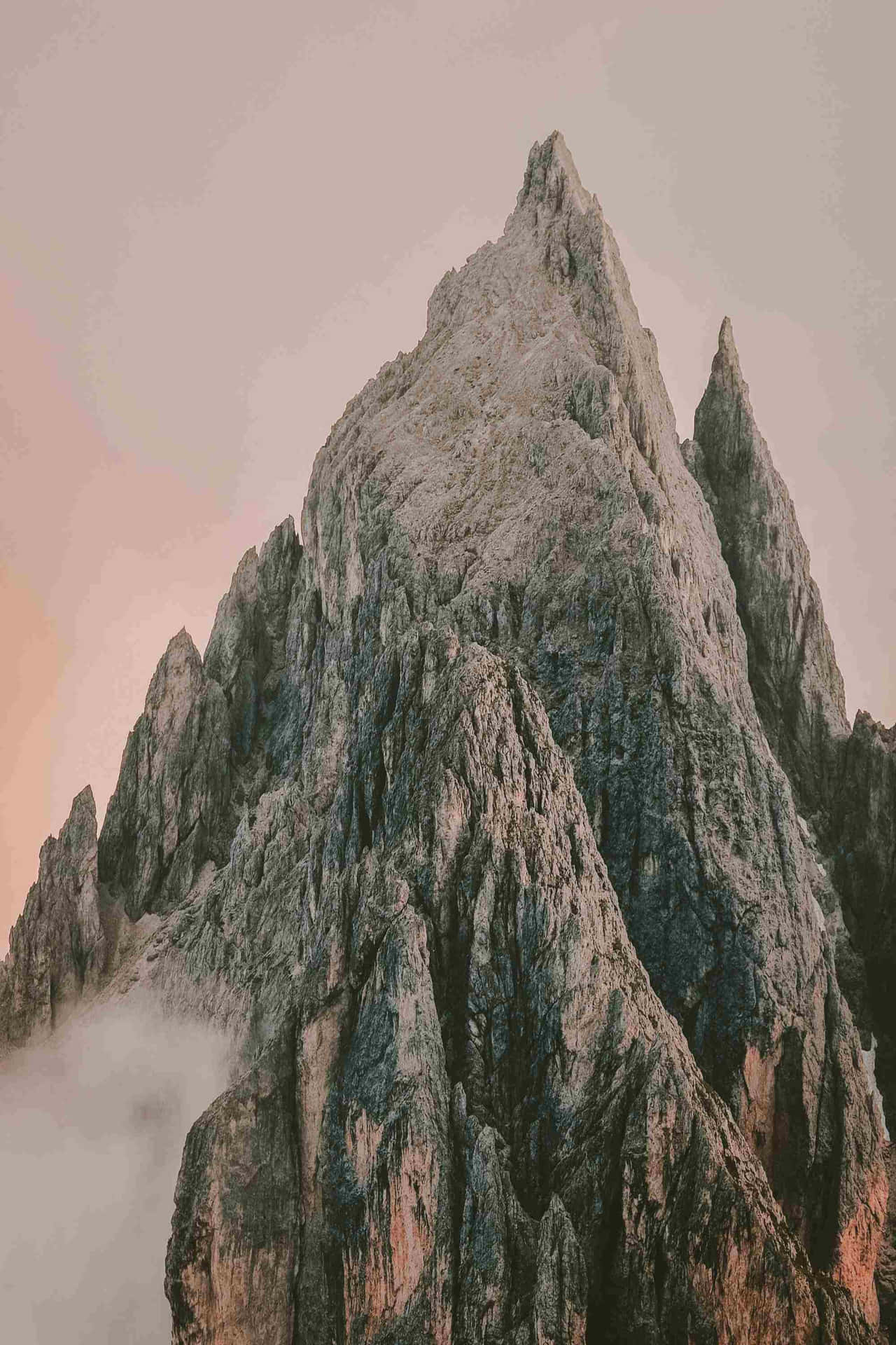 Majestic_ Mountain_ Peak_ Above_ Clouds.jpg Wallpaper