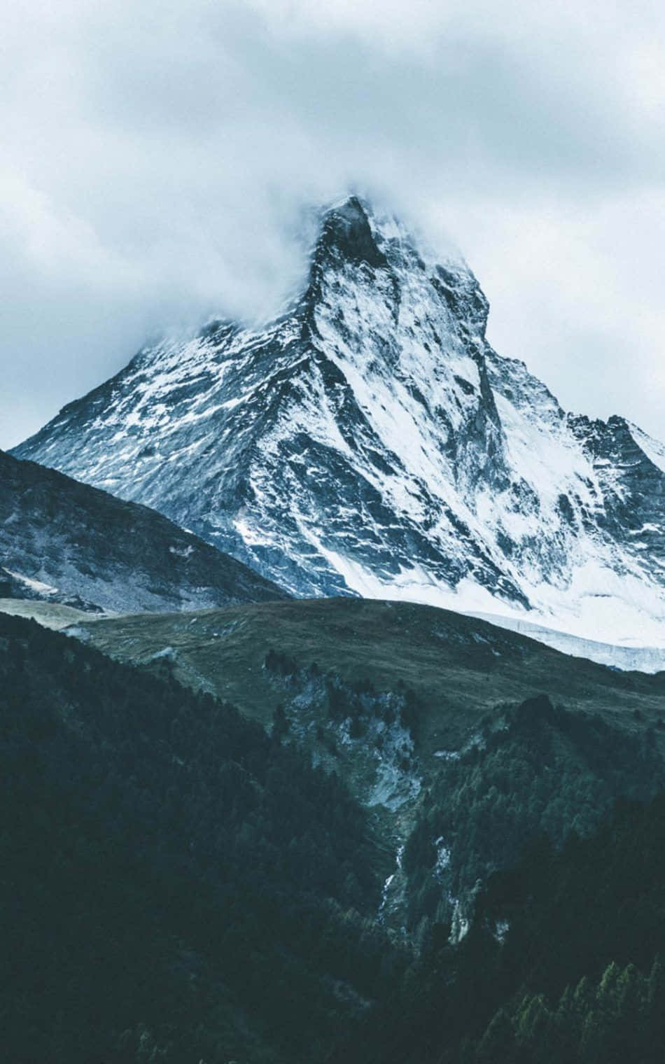 Majestic_ Mountain_ Peak_ Covered_in_ Snow.jpg Wallpaper