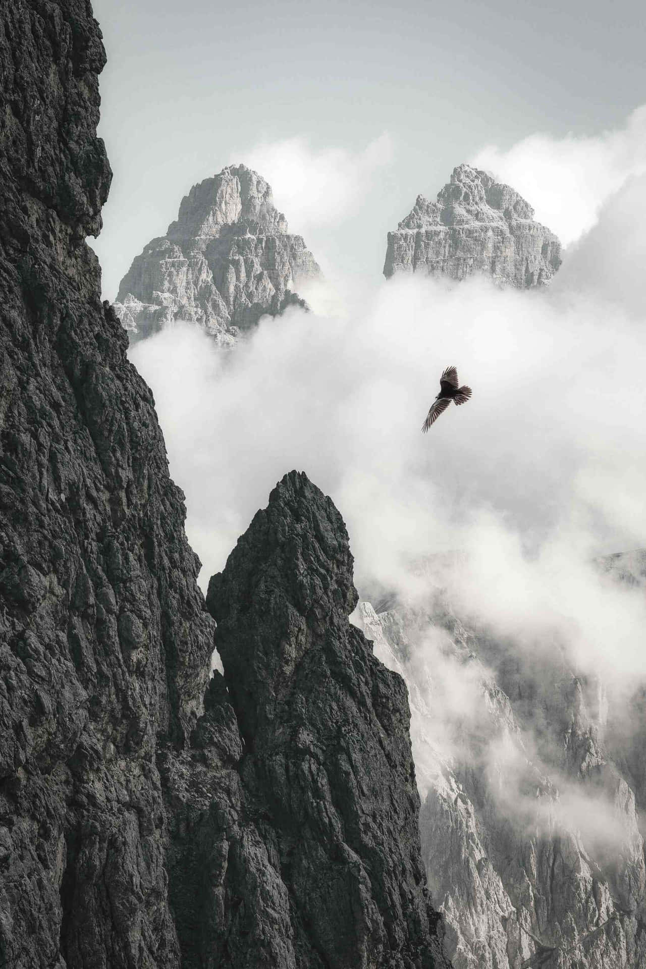 Majestic_ Mountain_ Peaks_ Amidst_ Clouds.jpg Wallpaper