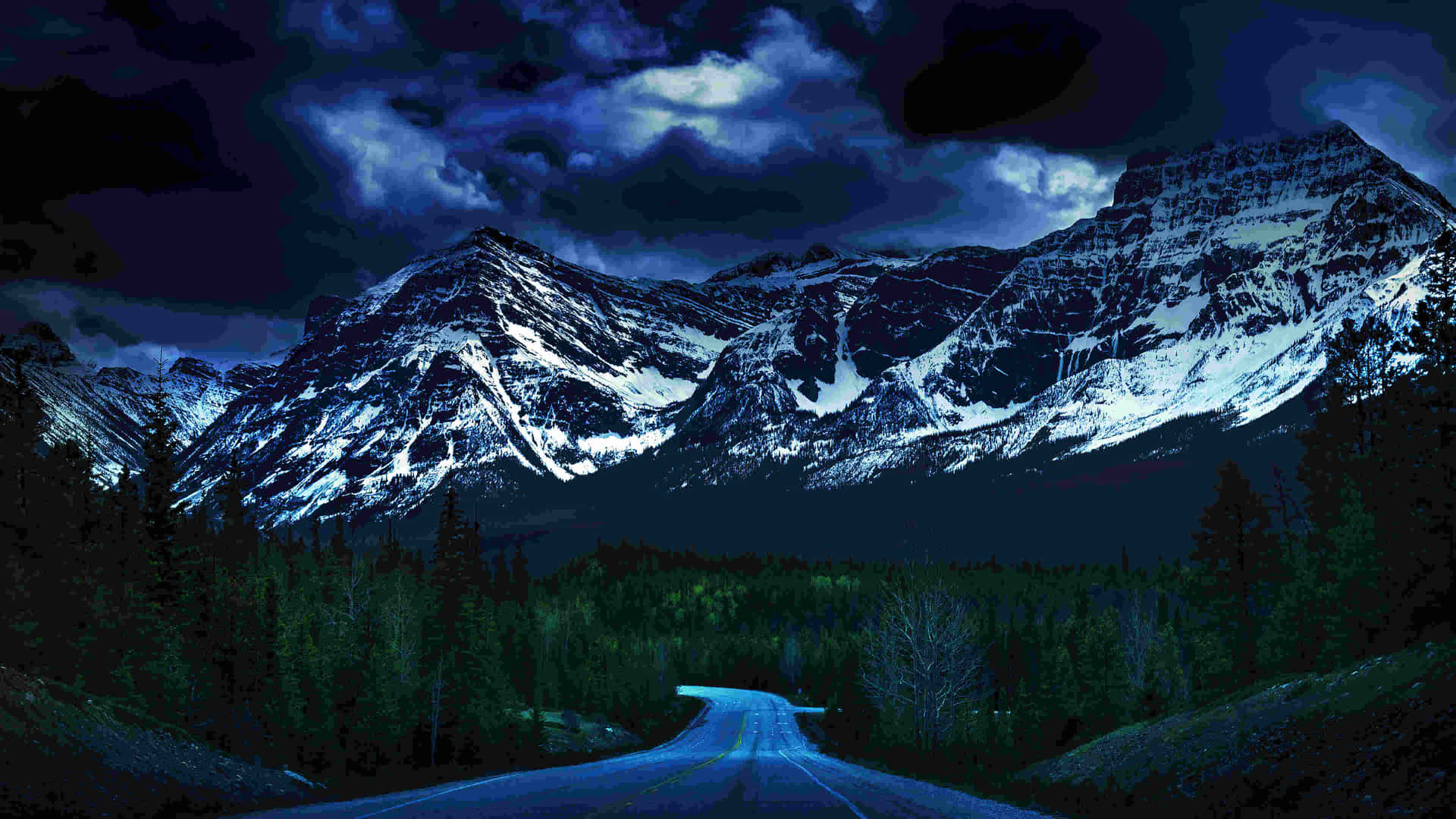 Majestic Nighttime Mountain Road4 K Wallpaper