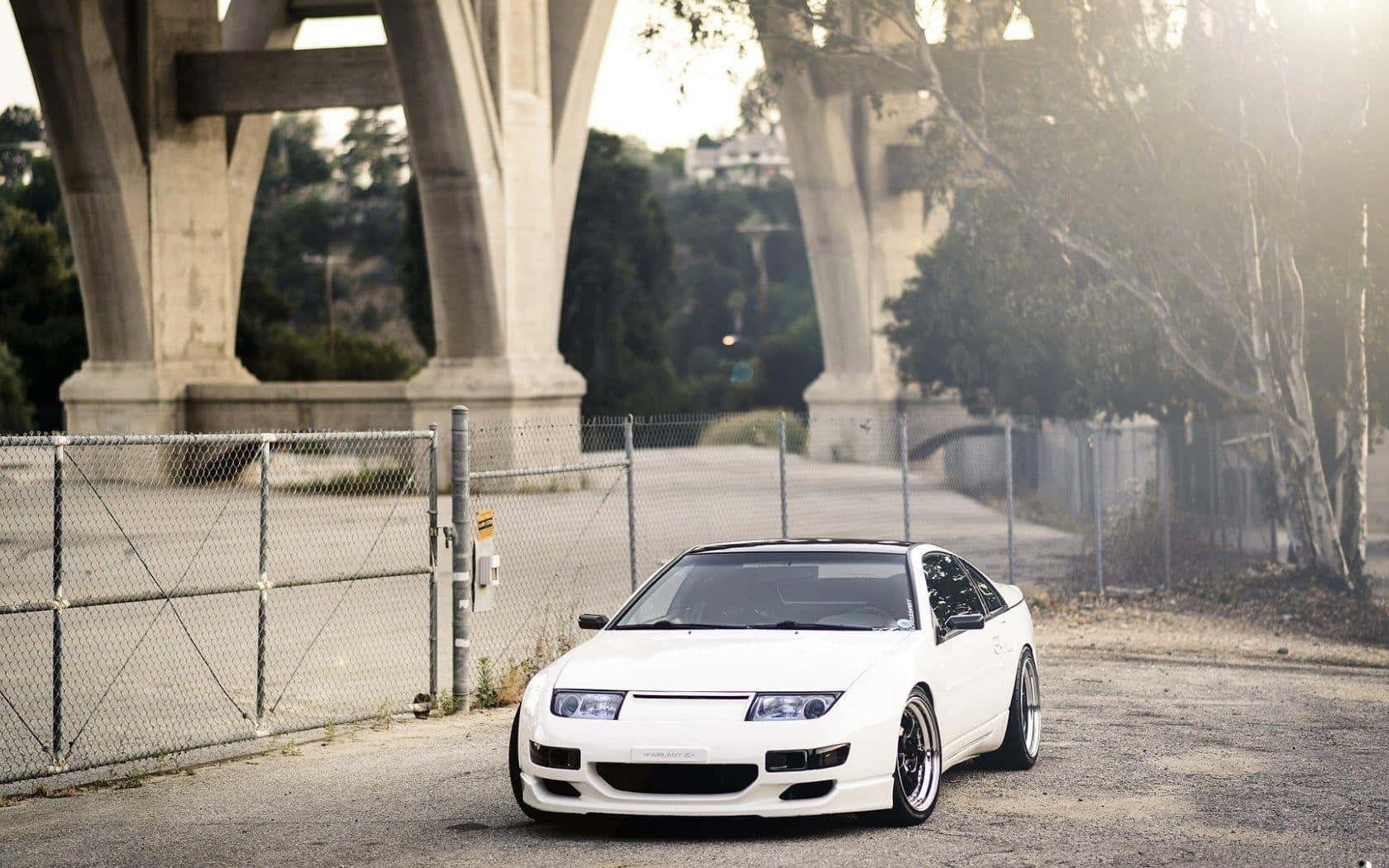 Majestic Nissan 300zx In Stunning Sunset Backdrop Wallpaper