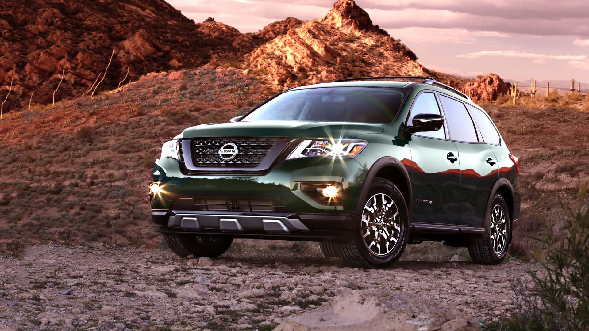 Majestic Nissan Pathfinder On The Road Wallpaper