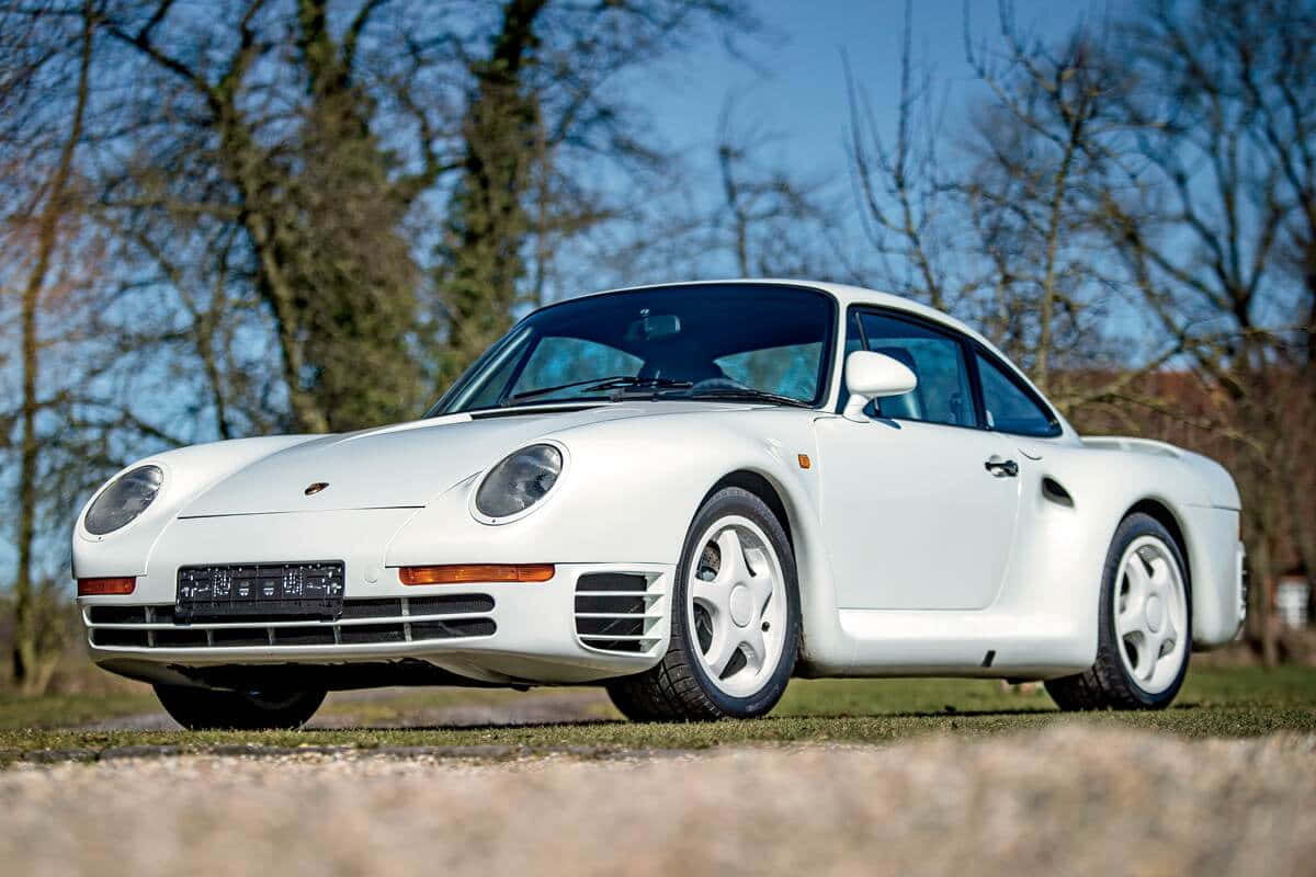 Majestetisk Porsche 959 I Sin Sanne Prakt Bakgrunnsbildet