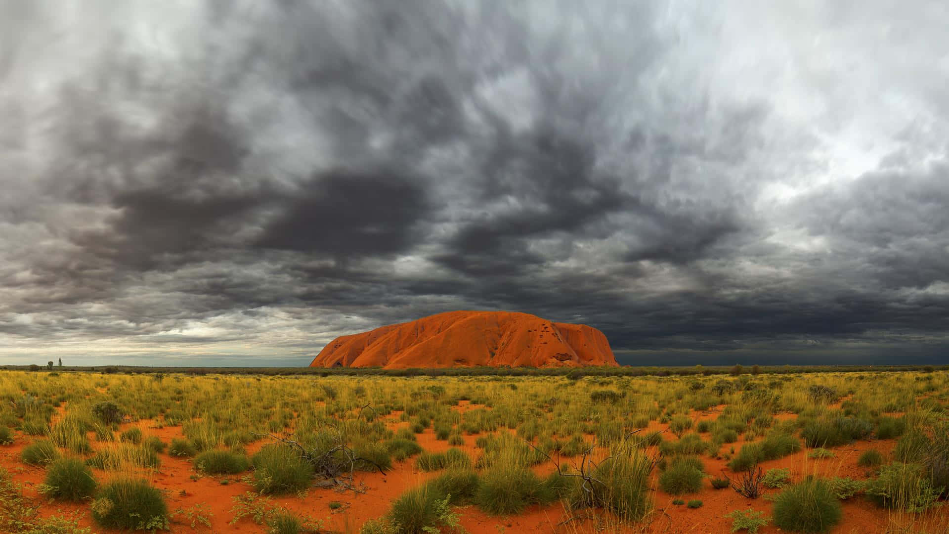 Majestic_ Red_ Rock_ Under_ Stormy_ Skies.jpg Wallpaper