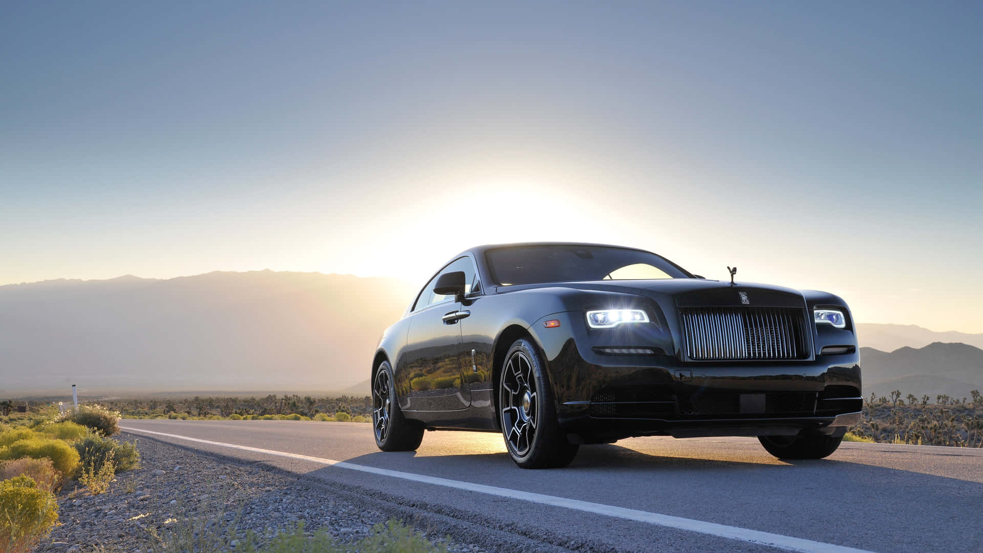 Majestic Rolls Royce Wraith Under The Spotlight Wallpaper