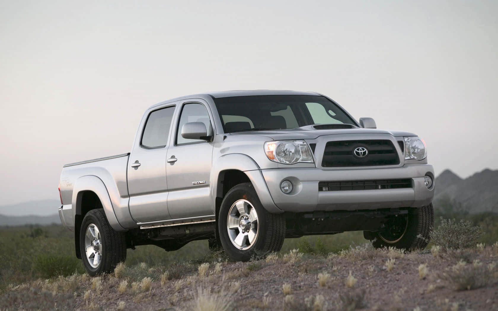 Majestic Silver Toyota Tacoma Dominating The Off-road Wallpaper