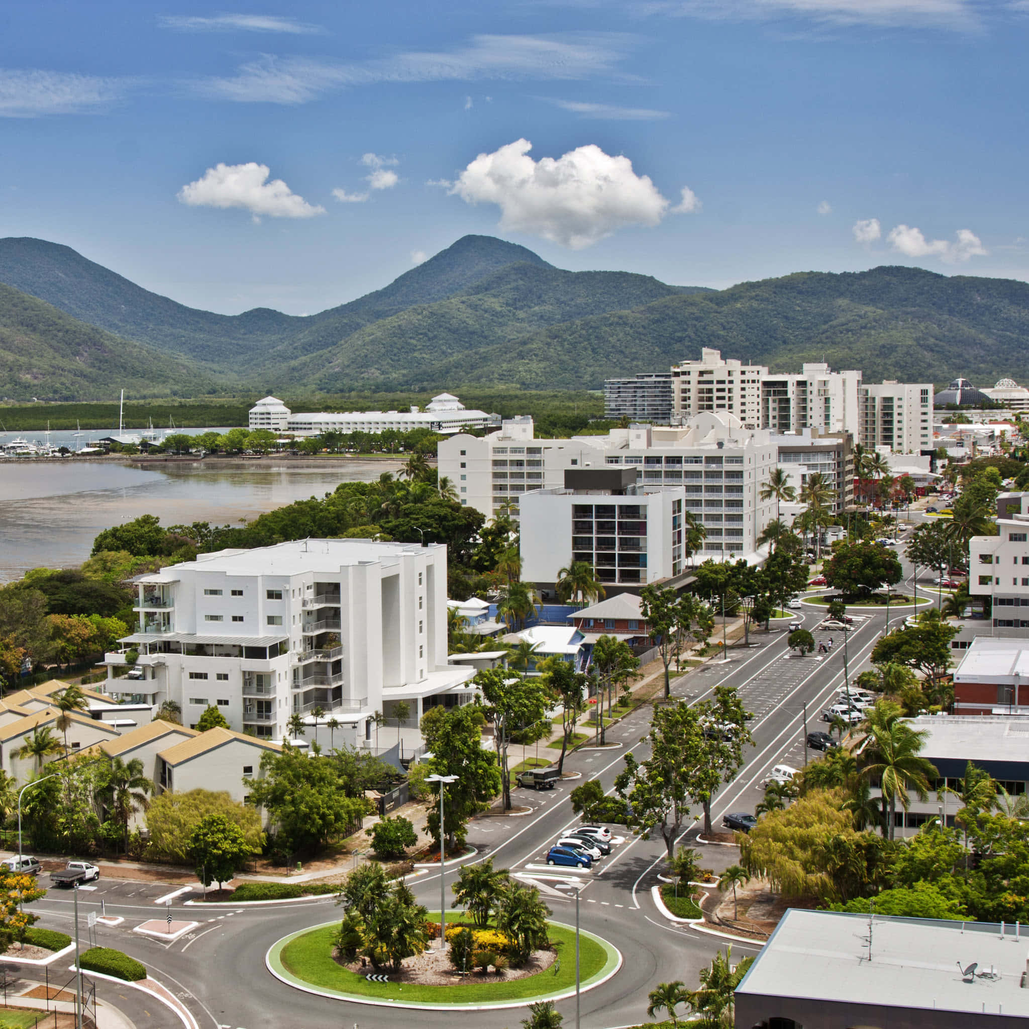 Majestic Skyline Of Tropical Cairns City At Dusk Wallpaper