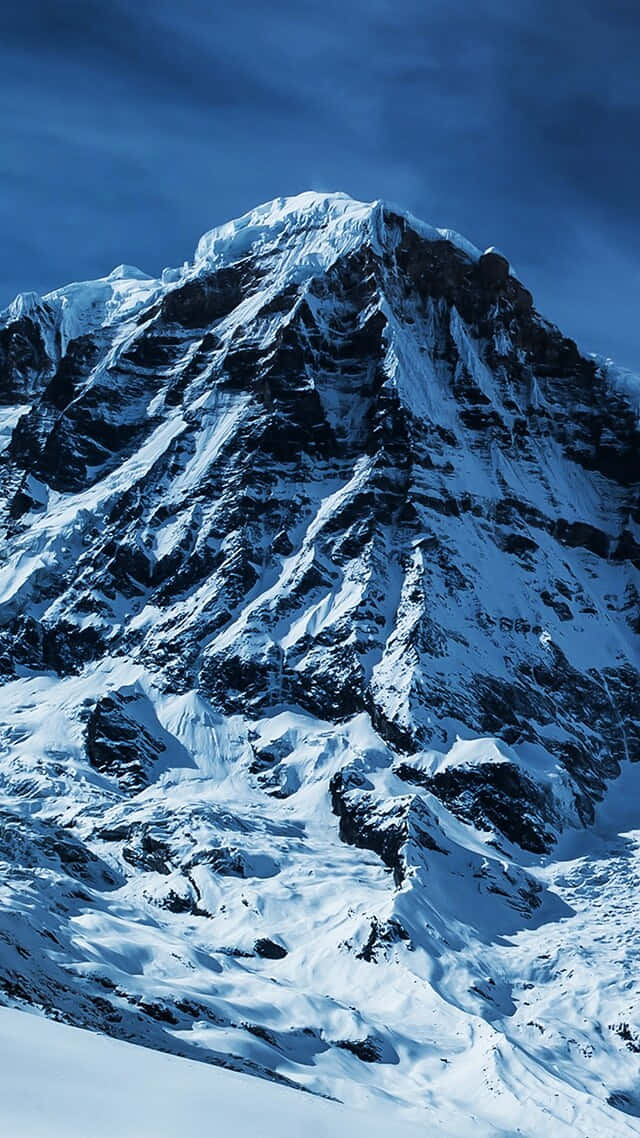 Majestic_ Snow_ Covered_ Mountain_ Peak Wallpaper
