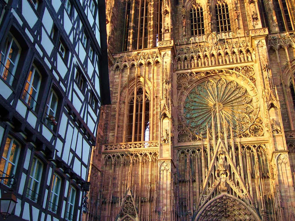 Majestic Strasbourg Cathedral Touching The Sky Wallpaper