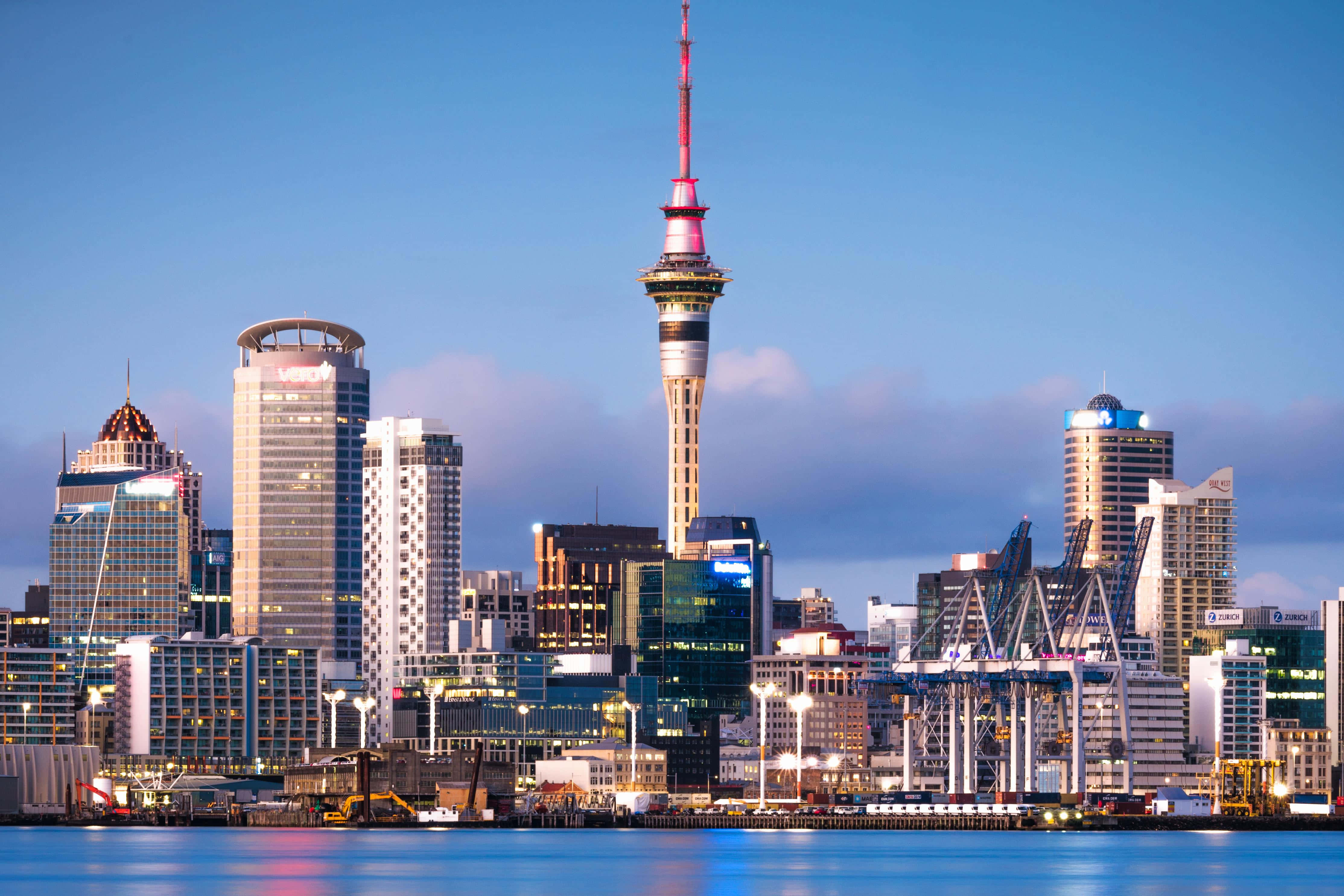 Download Majestic Sundown Over Auckland Sky Tower Wallpaper 