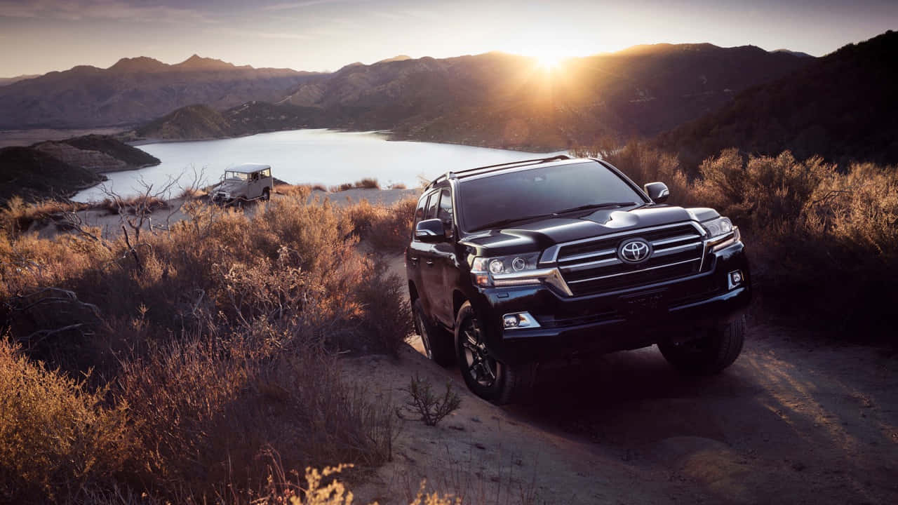 Majestic Toyota Land Cruiser Surrounded By Nature Wallpaper