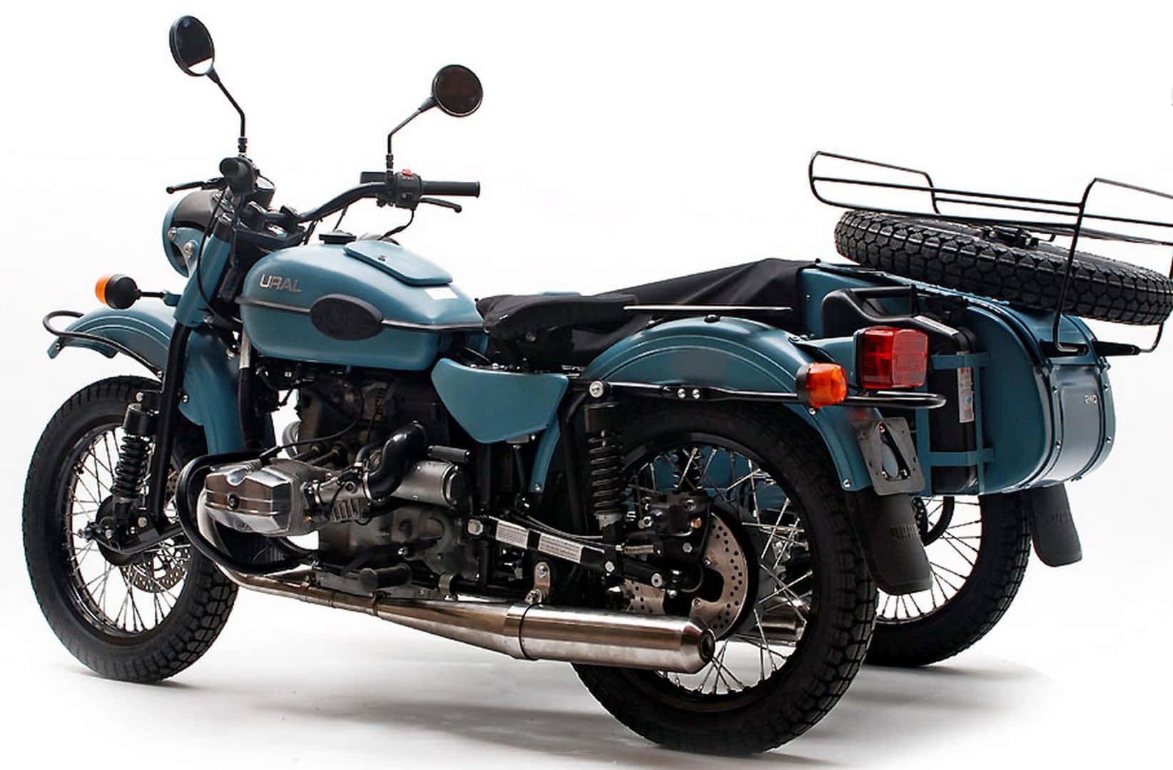 Majestic Ural Motorcycle Conquering The Snowy Wilderness. Wallpaper