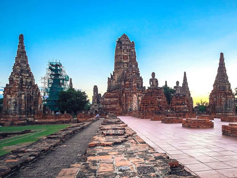 Majestic View Of Ancient Ruins In Ayutthaya Historical Park Wallpaper