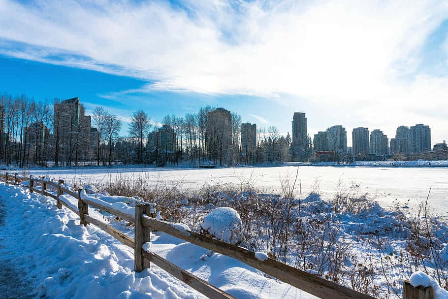 Majestic View Of Coquitlam City Skyline At Dusk Wallpaper