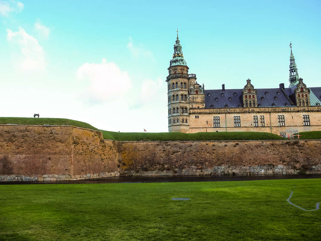 Majestic View Of Kronborg Castle At Sunset Wallpaper