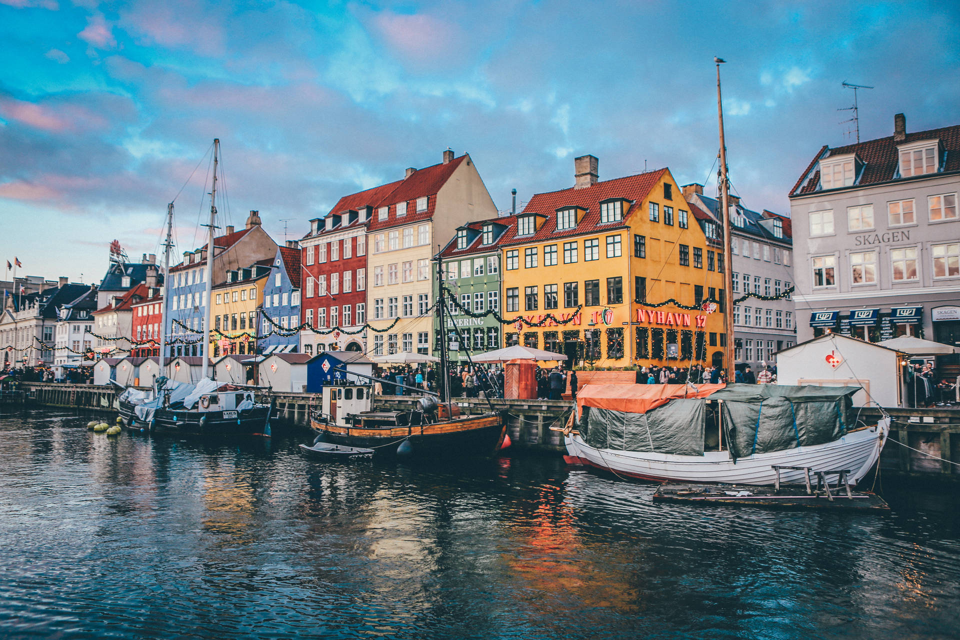 Majestic View Of Nyhavn Harbor In Denmark Wallpaper