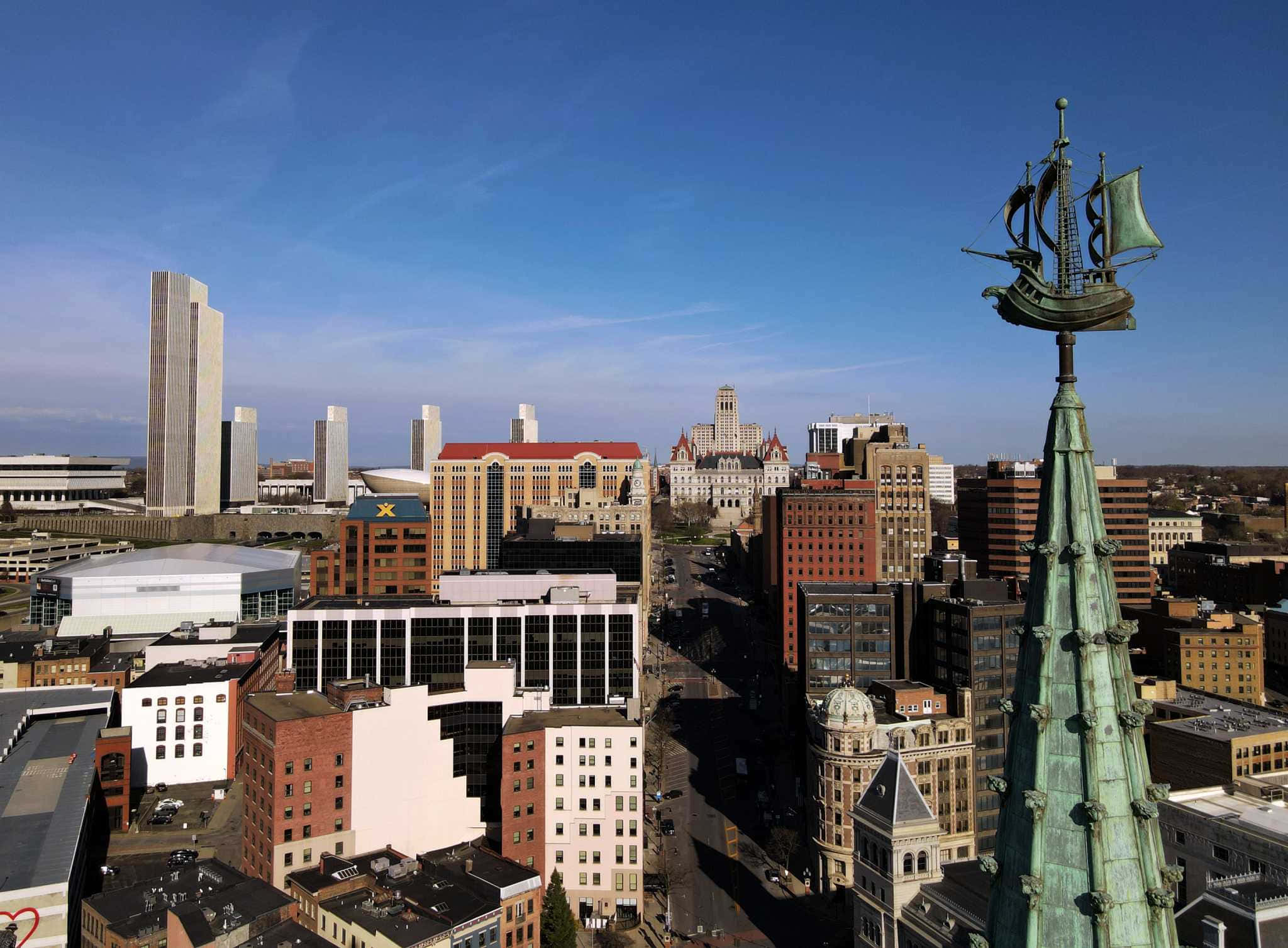 Majestic View Of Rochester Skyline At Sunset Wallpaper