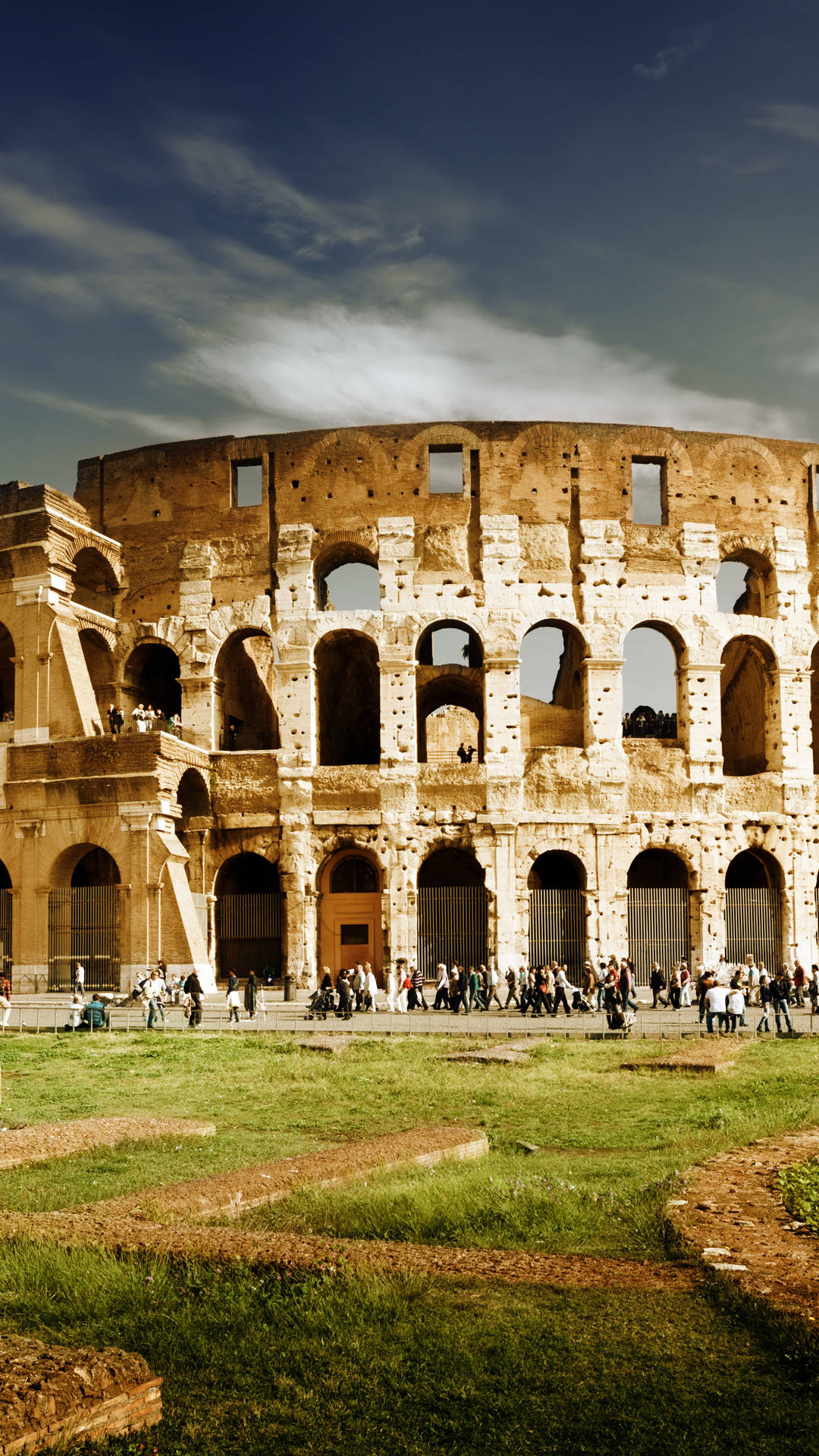 Majestic View Of The Ancient Colosseum In Rome, Italy Wallpaper