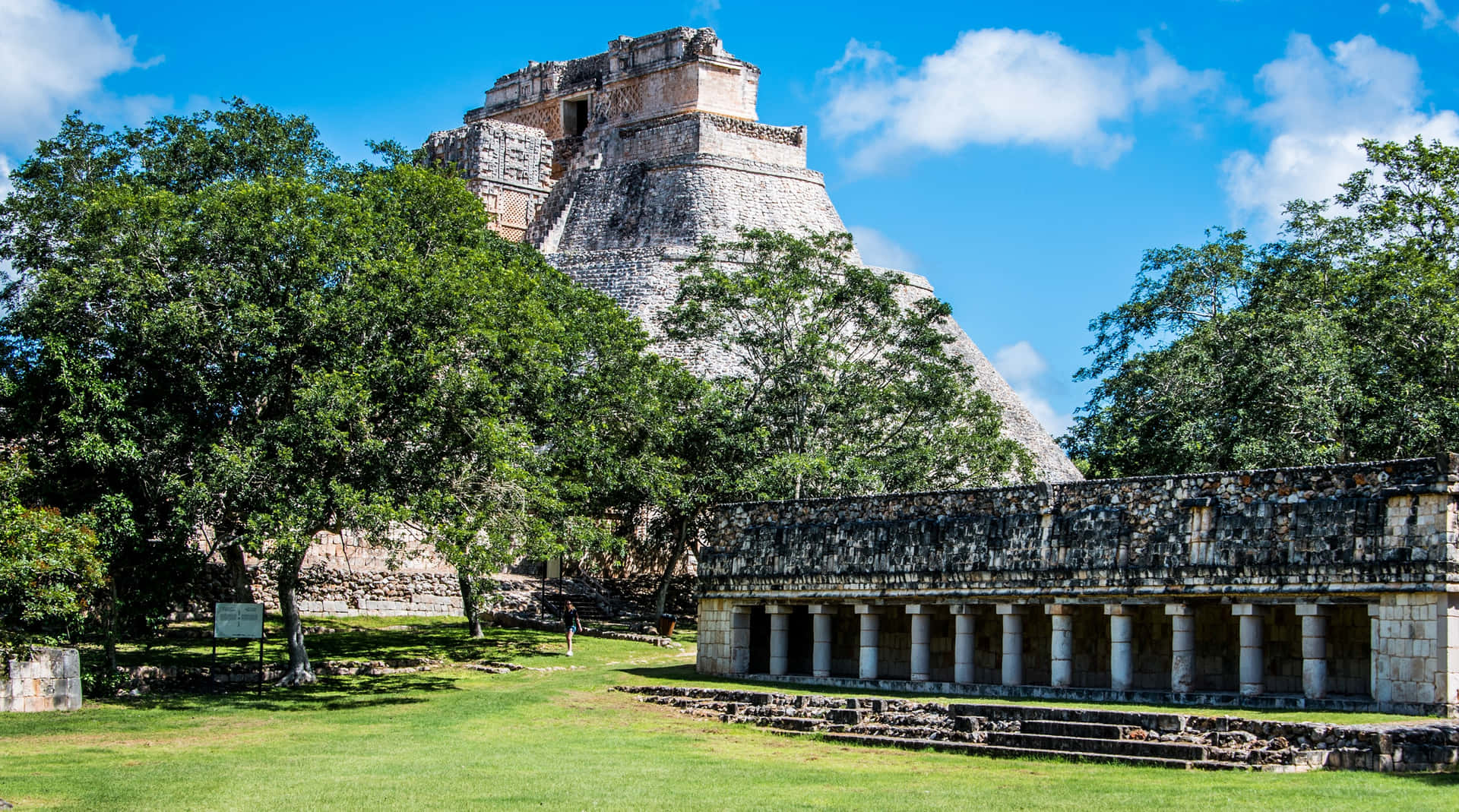Majestic View Of The Ancient Uxmal Mayan Ruins In Mexico Wallpaper
