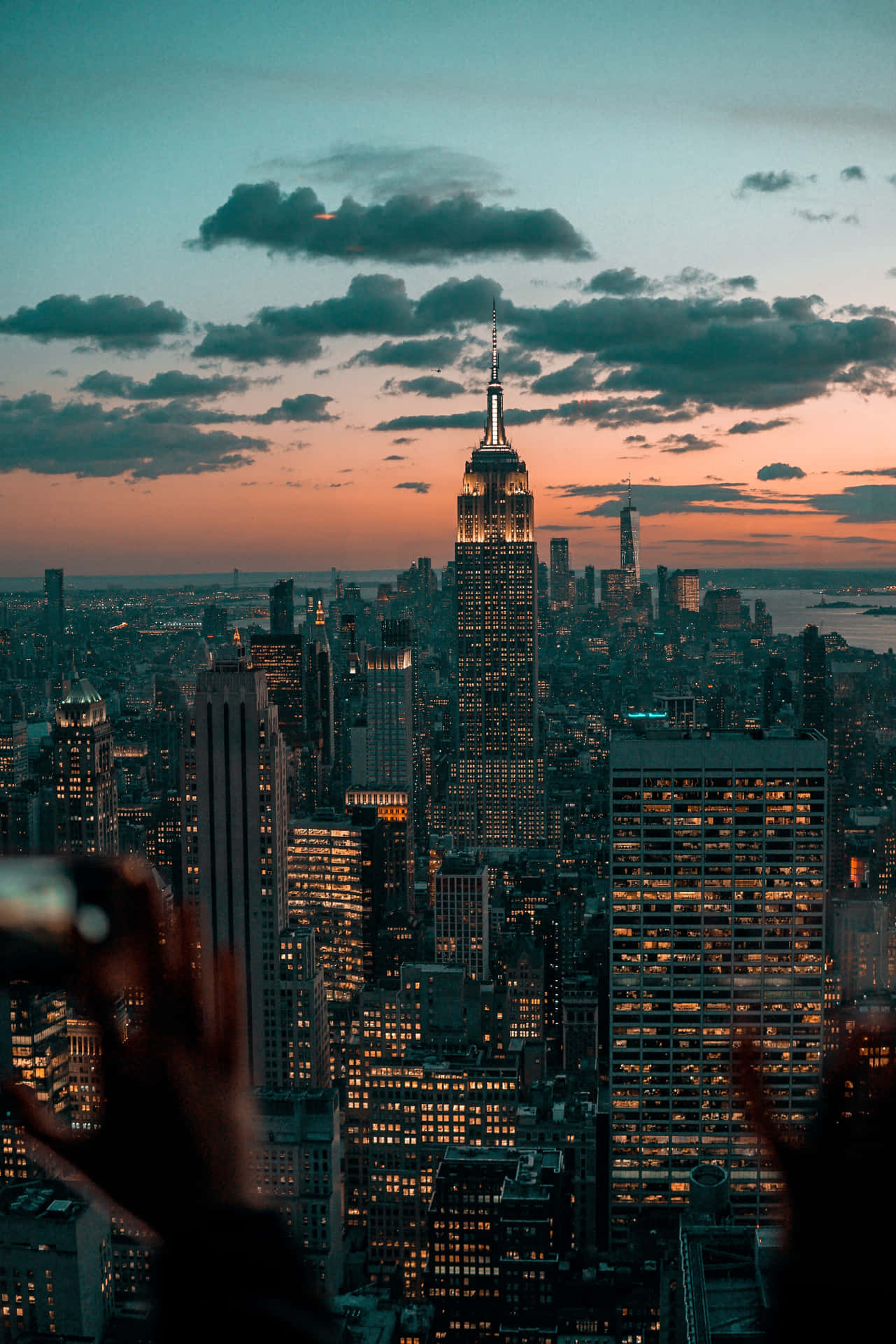 Majestic View Of The Empire State Building Under The Stunning Sunset Glow.
