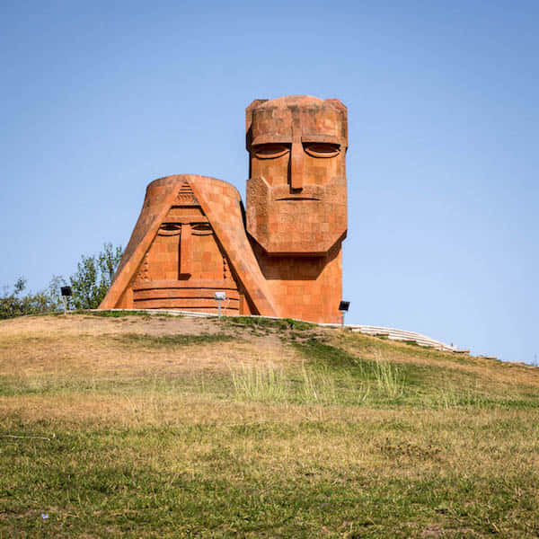 Majestic View Of We Are Our Mountains Monument Wallpaper