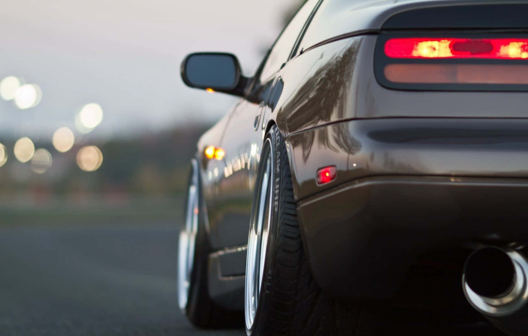 Majestic Vintage Nissan 300zx Dominating The Road Wallpaper