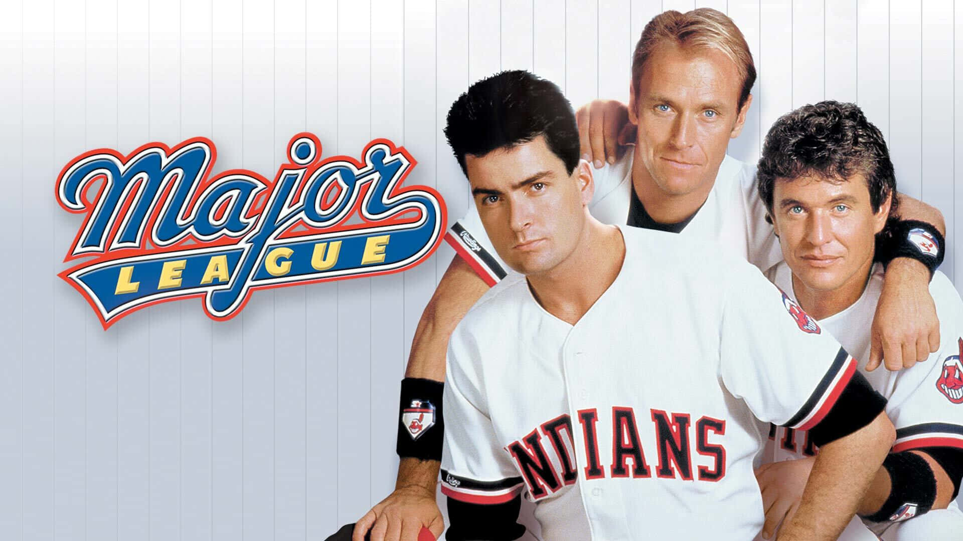 A group photo of the Major League Movie cast during gameplay, wearing their team uniforms on the baseball field. Wallpaper