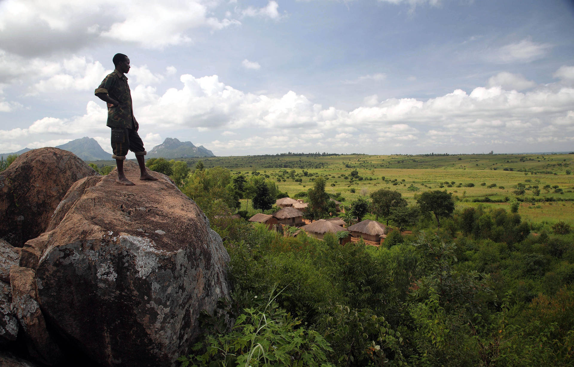 Malawi Man Looking Beyond Wallpaper
