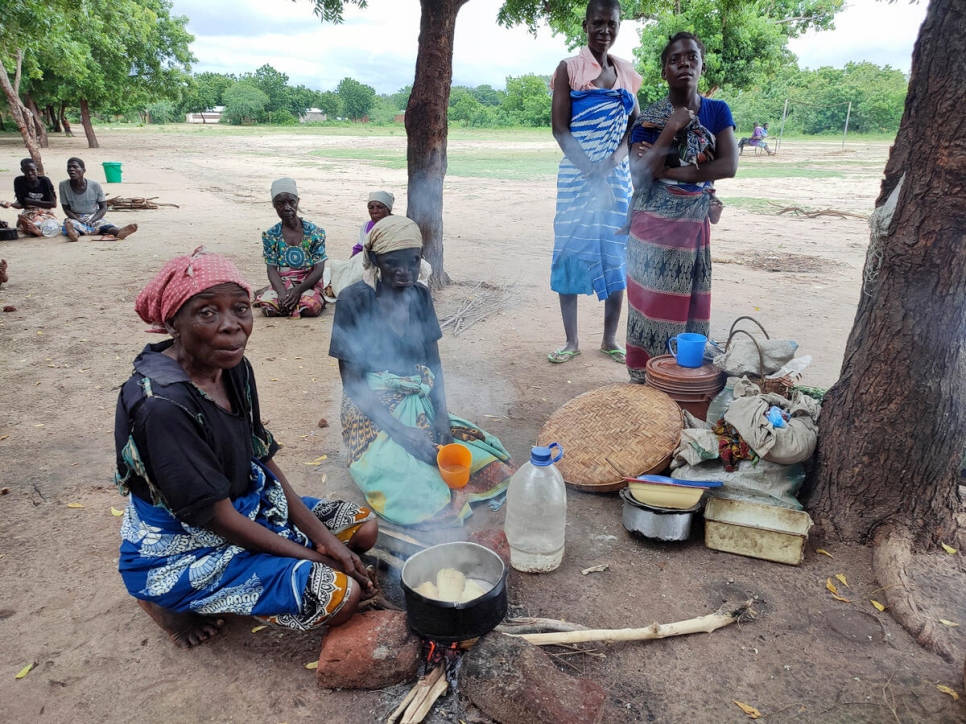 Malawi Women Cooking Stove Wallpaper